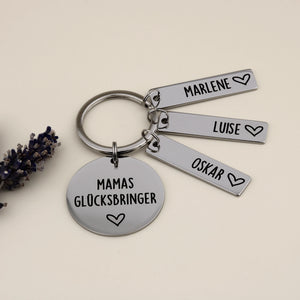 Mamas-Glücksbringer-Schlüsselanhänger mit drei Namensanhängern und Lavendel.