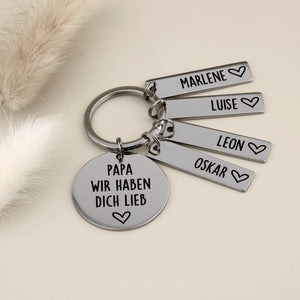 Papa wir haben dich lieb Schlüsselanhänger mit vier Namensanhängern für Marlene, Luise, Leon und Oskar.