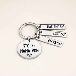 Personalisierter Schlüsselanhänger „Stolze Mama von“ mit drei Namensanhänger: Marlene, Luise und Oskar.